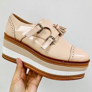 Nude patent striped loafer